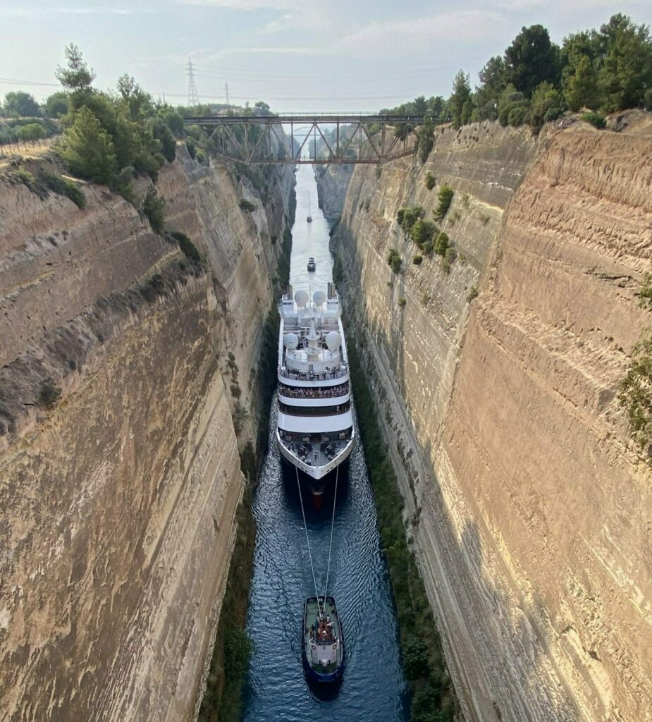 Ship being guided through the Corinth Canal